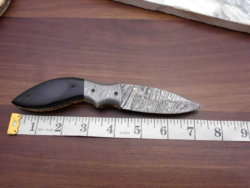 7.5" Folding Knife, 3.5" Legal Hand Forged Twist Pattern Damascus Steel Blade, Black & White Scales Available, Pocket Knife, Liner Lock & Thumb knob Equipped, Cow Hide Leather Sheath Included